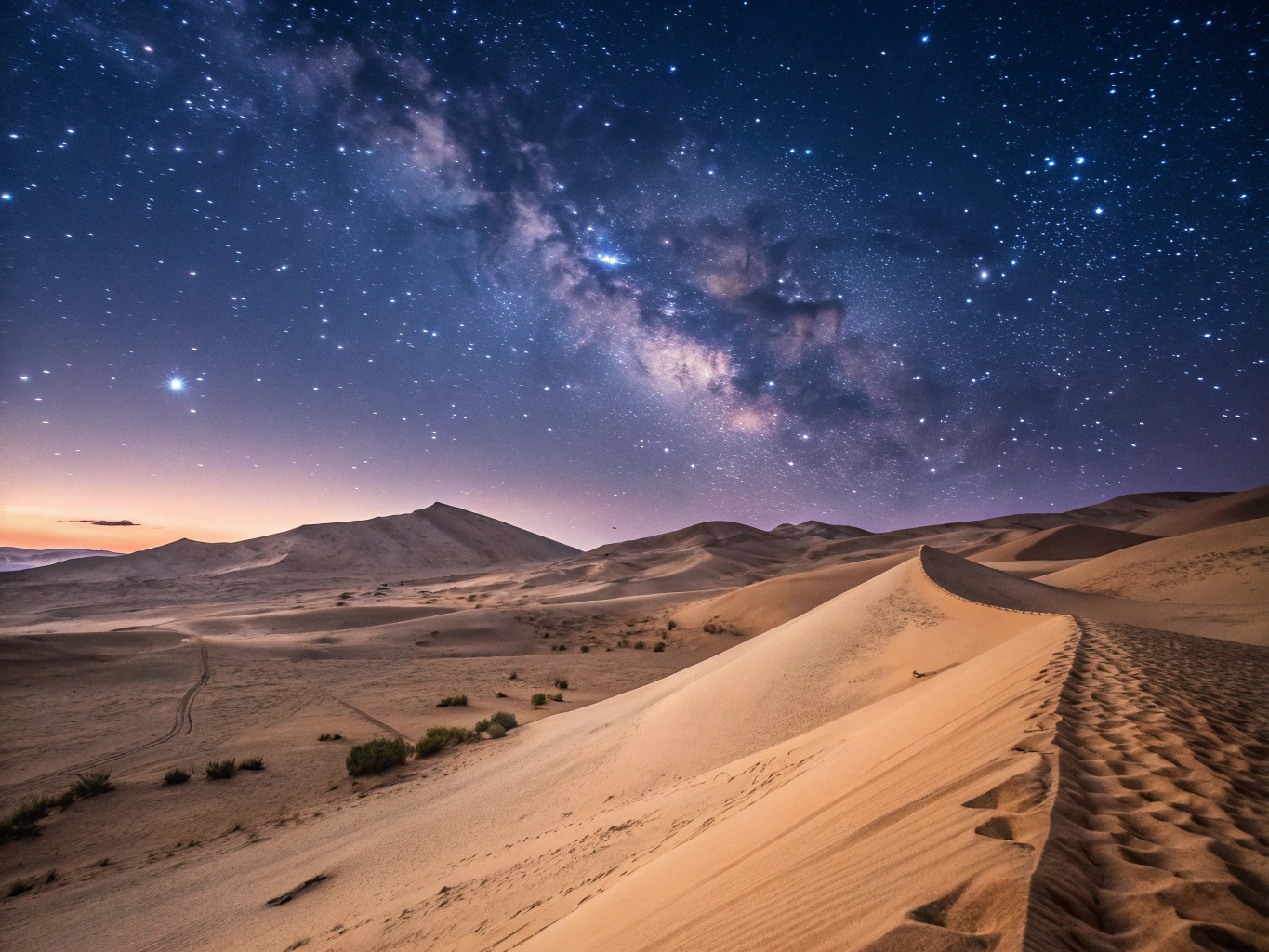 Sandboarding under a starry desert sky